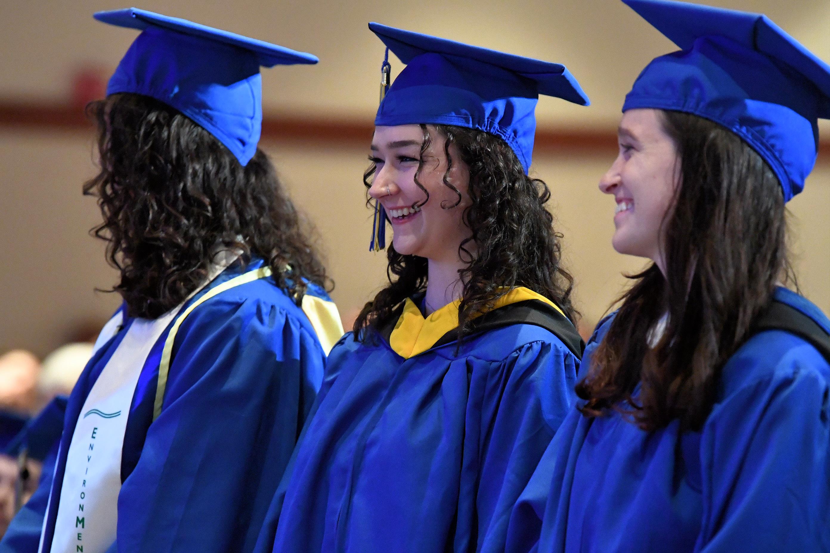  Graduates smiling at CEOE convocation