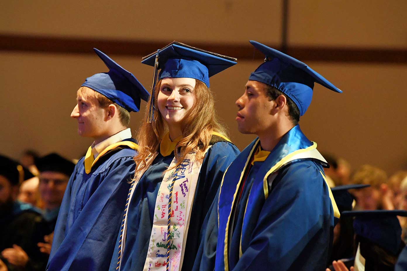 Students await receiving their diplomas at CEOE Convocation 2024