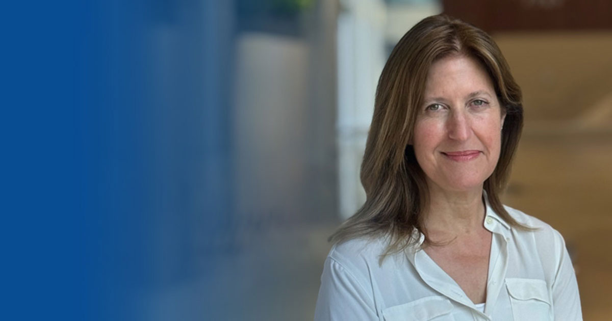 A headshot of Jillian Trabulsi in the STAR building with a blue graphic like background to the left of her image. 