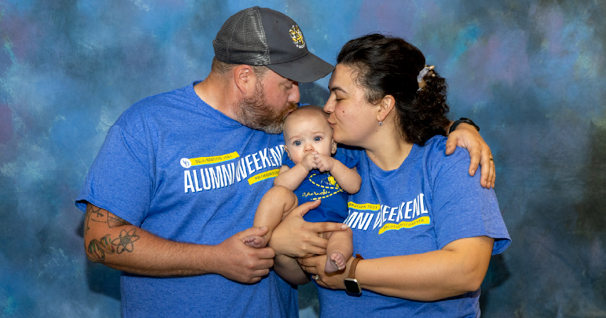 A family and their future Blue Hen.
