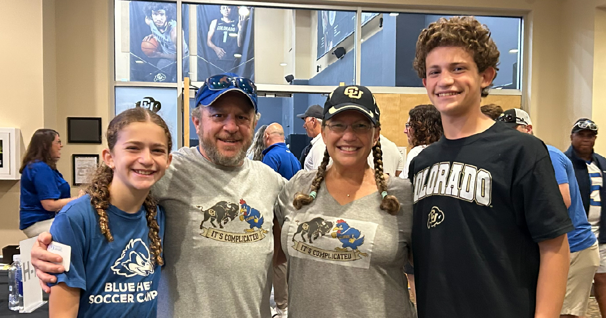 Family at Blue Hen tailgate in Colorado.
