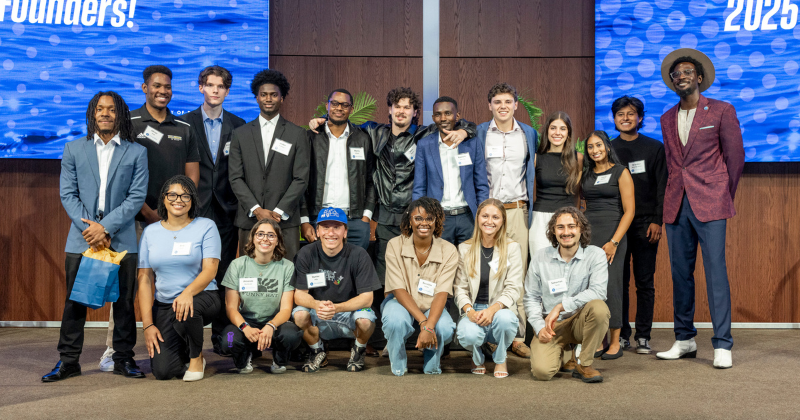 2025 Summer Founders standing on stage in a group photo