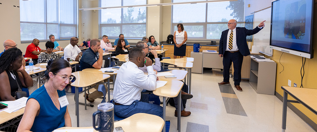 Teacher training in a classroom setting.