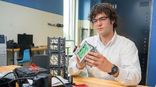 Timothy “T.J.” Tomaszewski working in the lab.