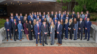 A group of Lerner Students posing for a photo.