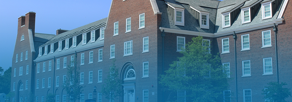 A light blue fade from the bottom of the image of South Academy residence hall