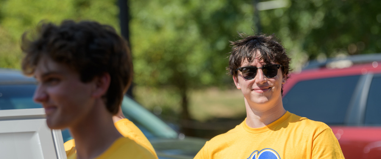 Student wearing sunglasses on a sunny day