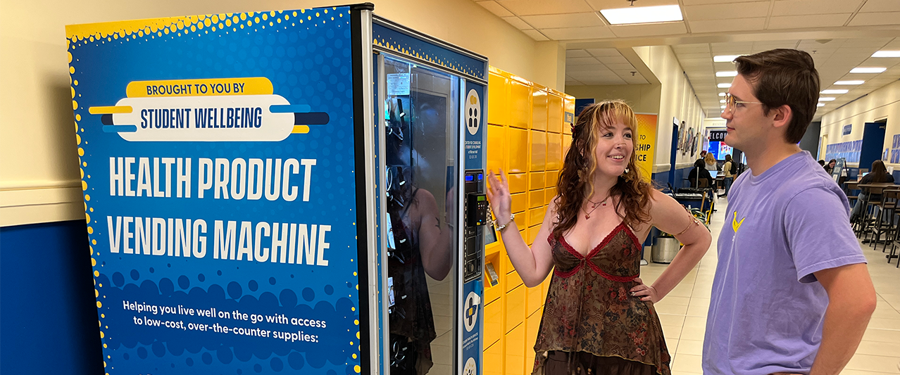 Students using the Wellbeing Vendine Machine in Perkins