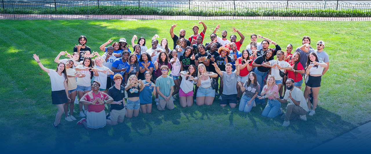 Fraternity and sorority members gathered for a group photo