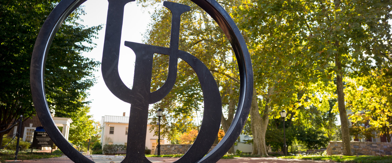 UD logo on an exterior gate