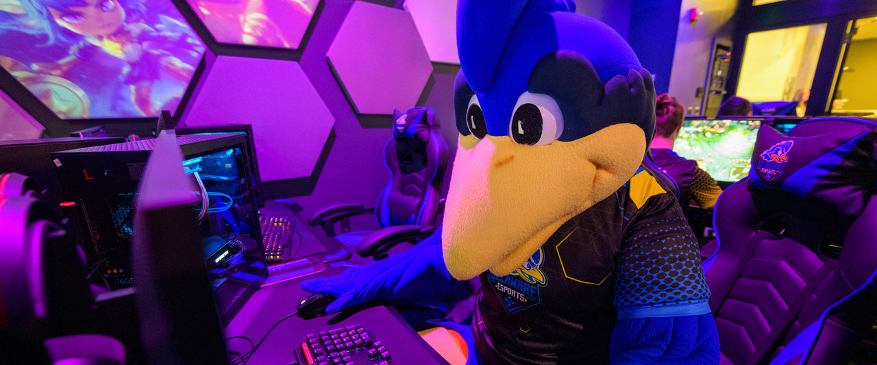 YoUDee plays games in the Esports Arena