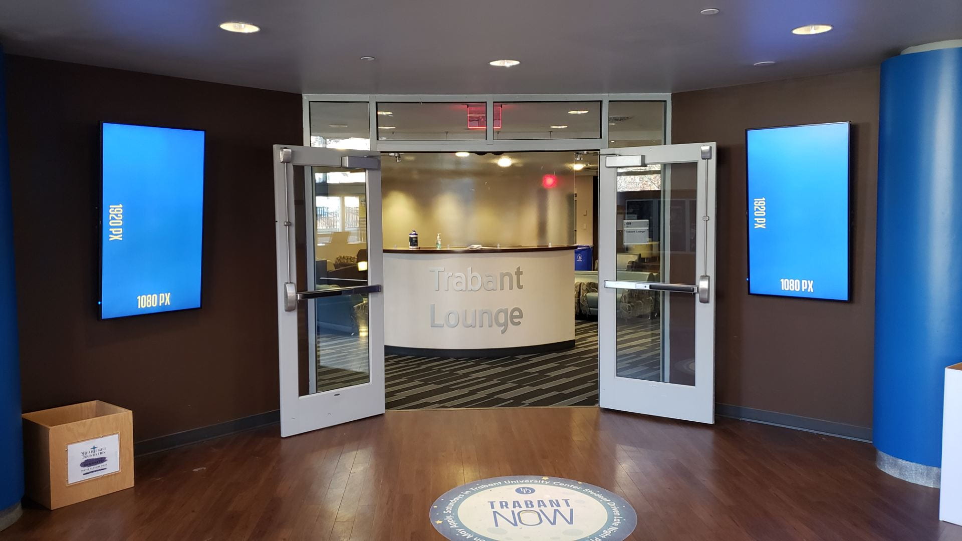 Two displays outside Trabant Lounge entrance