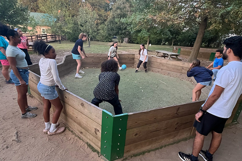 Students playing kickball