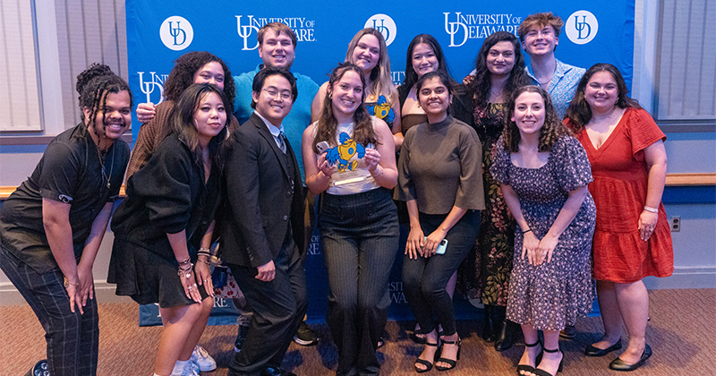 Student Centers staff and YoUDee Award winners with their trophies