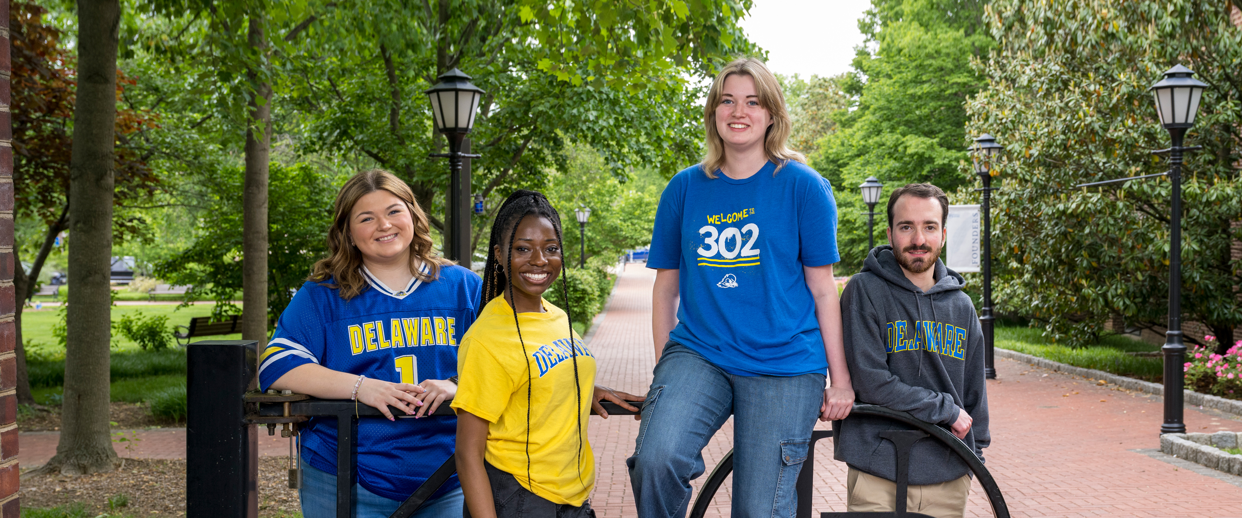 a group shot of Orientation Leaders posing on The Green
