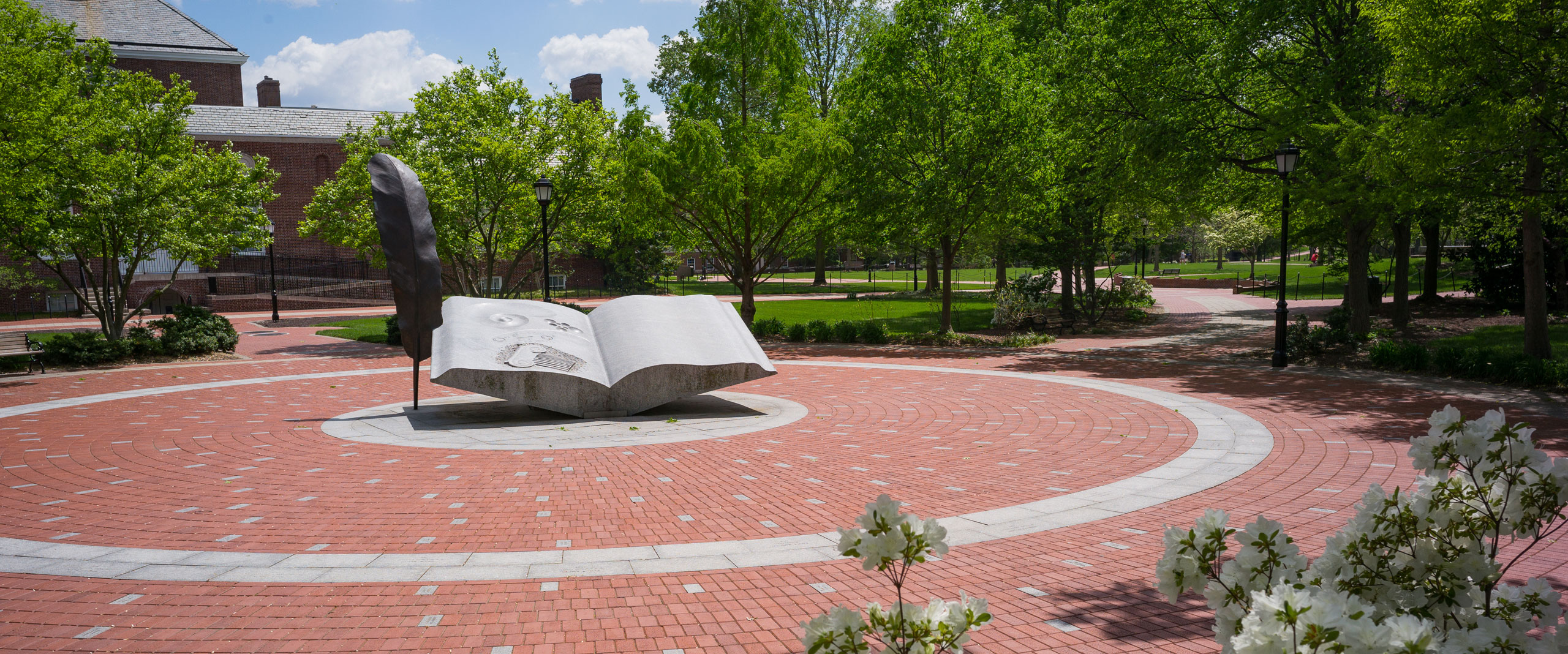 the Wings of Thought sculpture on a spring day in UD's Mentors' Circle
