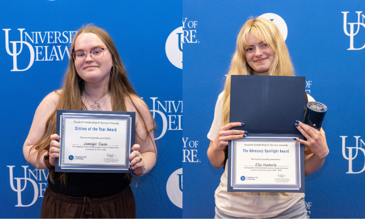 Students holding award certificate