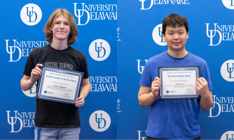 Students holding award certificate