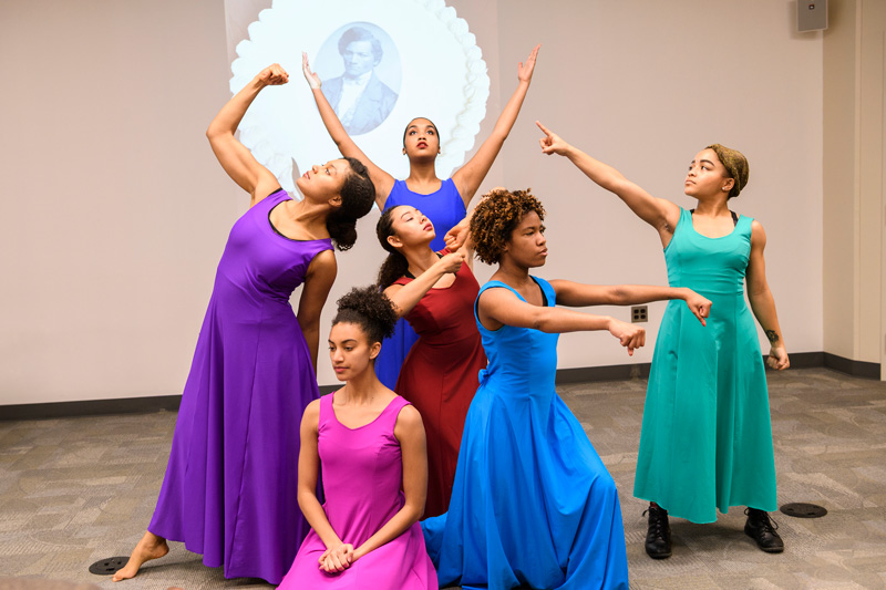 With an image of Frederick Douglass in the background, dancers added a different artistic element to the transcribe-athon.