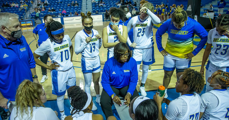 Women's Basketball Team with Coach Adair