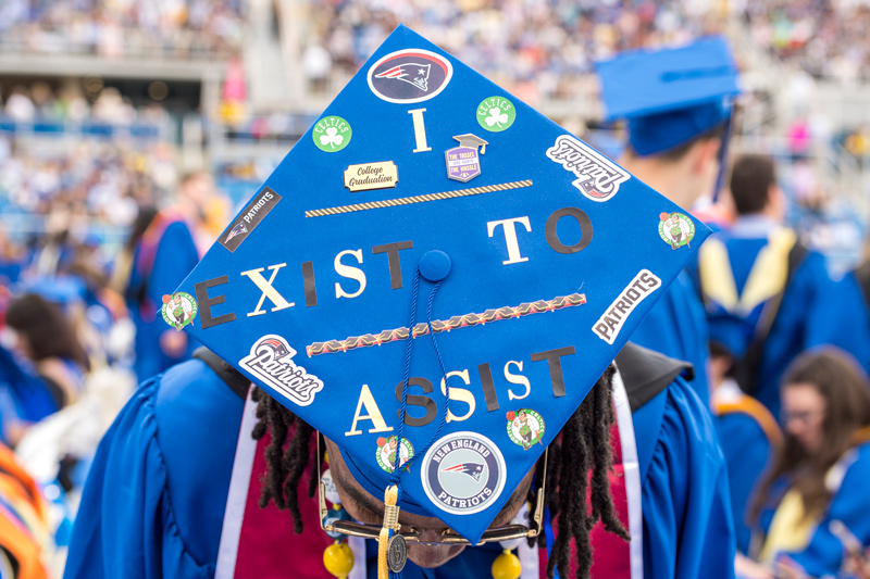 Christopher Howell, who graduated with a bachelor of science in human services, shows off his decorated cap.