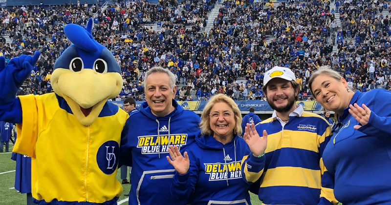From left to right are YoUDee, President Dennis Assanis, Eleni Assanis, Brian Chansky and Kerry Orendorf Halbedl, Lerner College Class of 2002.