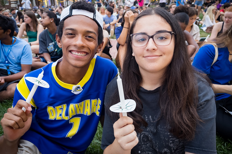 Two students with candles