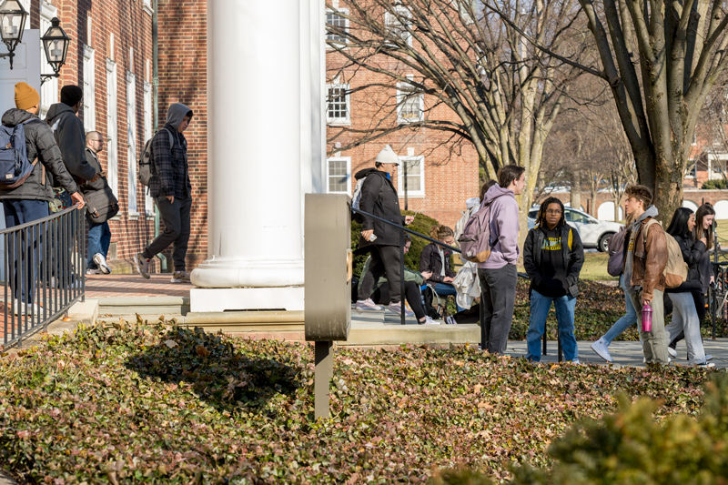 Students walk to class on the first day of the 2023 spring semester at the University of Delaware.