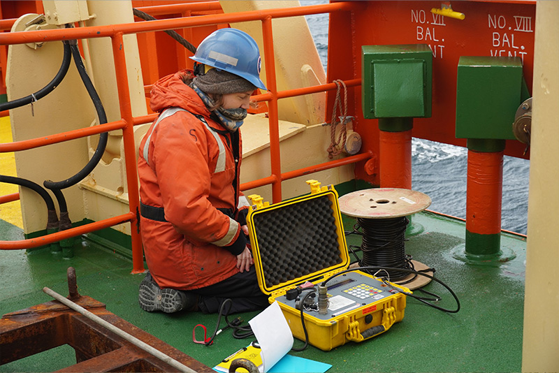 Frederike (Rike) Benz, a doctoral student studying physical oceanography under the guidance of Carlos Moffat, associate professor in the School of Marine Science and Policy, does field work on a ship off Antarctica.