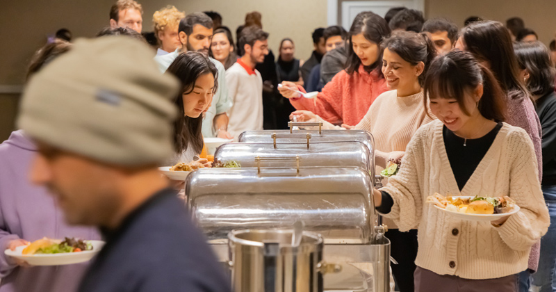 International students gather for a meal during US holiday Thanksgiving