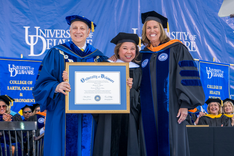 UD President Dennis Assanis and Board Chair Terri L. Kelly awarded an honorary doctor of humane letters degree to Marichu Valencia, a community leader and philanthropist who serves on the UD President’s Leadership Council and the board of directors for the Ronald McDonald House and the Boys and Girls Club of Delaware.