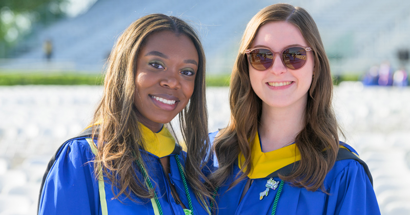 UD graduates Kayla Jones and Amanda Leonhard