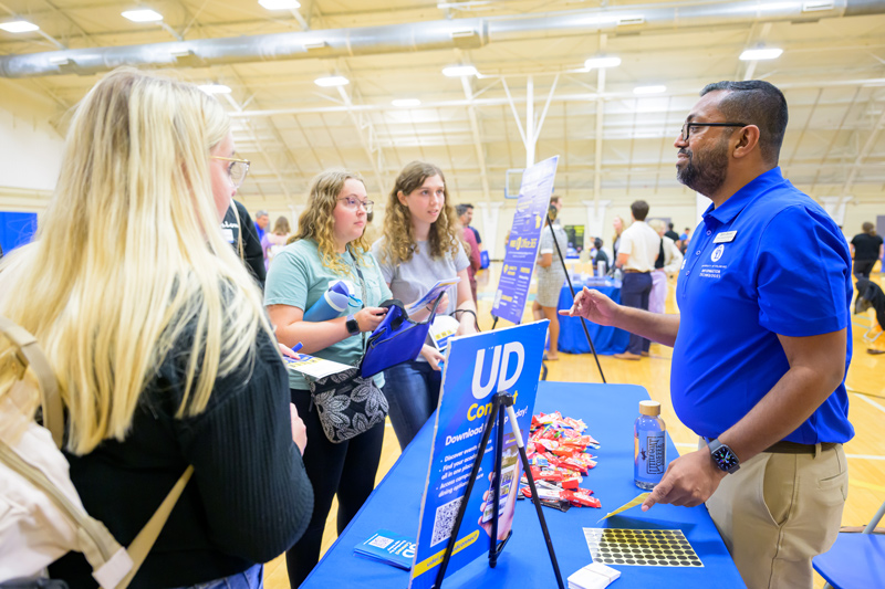 Following speaker presentations at the New Graduate Student Orientation, students headed to the Carpenter Sports Building for a resource fair.