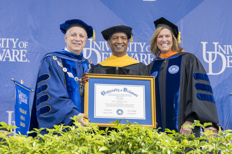 UD President Dennis Assanis (left) and Board Chair Terri L. Kelly (right) awarded an honorary doctor of science degree to KR Sridhar, founder, chairman and CEO of Bloom Energy.