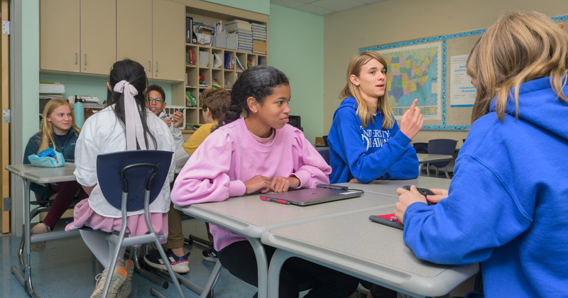 Students participate in a classroom discussion at the College of Education and Human Development’s The College School, a school that serves students with learning differences in grades 1-8.