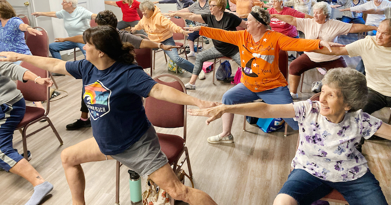 Grants from the Delaware Division of Services for Aging and Adults with Physical Disabilities supported healthy aging classes like this chair yoga session at the Weston Senior Center. 