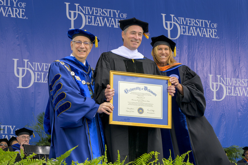 Commencement speaker Matt O’Donnell, UD alumnus and co-anchor of “Action News Mornings in Philadelphia, received an honorary doctor of humane letters degree from UD President Dennis Assanis (left) and Board Chair Terri L. Kelly (right).