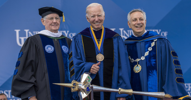 John Cochran, Chairman of the Board of Trustees; Joseph R. Biden Jr., the 46th president of the United States and UD alumnus; and UD President Dennis Assanis stand together during the University’s Commencement in 2022. Assanis presented Biden with one of UD’s highest honors, the Medal of Distinction. 