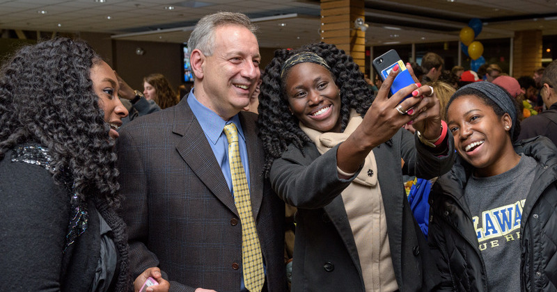 Students pose for a selfie with UD President Dennis Assanis at a student reception in his honor during his inauguration festivities. 