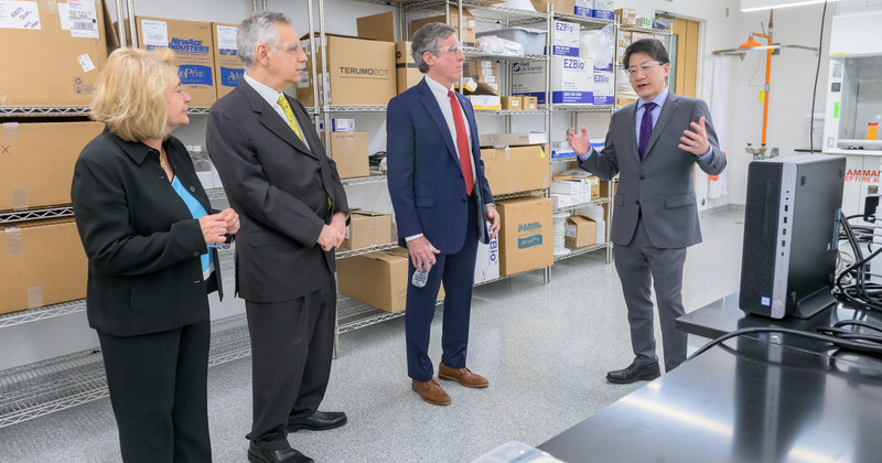 Joined by President Assanis, then Delaware Governor John Carney received a tour of facilities for the National Institute for Innovation in Manufacturing Biopharmaceuticals (NIIMBL), guided by Kelvin Lee.