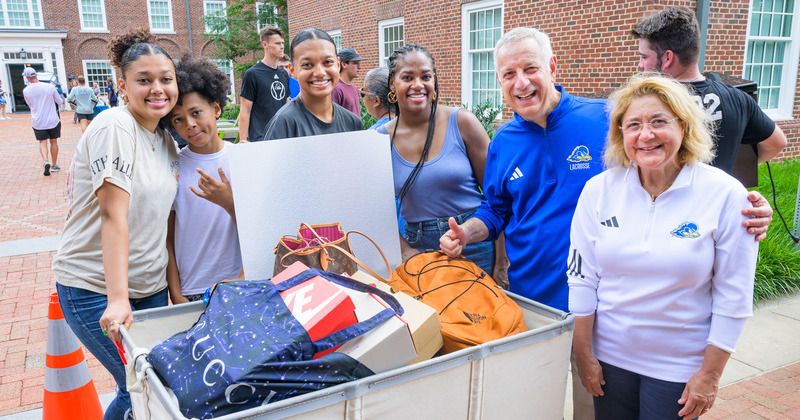 President Assanis and Mrs. Assanis greet students during Welcome Days and student move-in.  