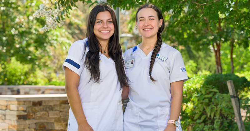 School of Nursing seniors Jaidyn Morales-Devine (left) and Erica Di Corpo (right) spent their summers as Flynn Fellows exploring the world of pediatric oncology. Morales-Devine interned at the Children’s Hospital of Philadelphia, and Di Corpo interned at Boston Children's in her home state of Massachusetts. 
