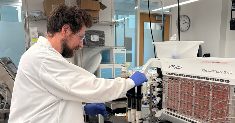 Research associate Paul Kaznica runs experiments in NIIMBL's Process Intensification Testbed on the University of Delaware’s STAR Campus. The facility is designed to accelerate the development of more efficient processes for making monoclonal antibodies and other lifesaving therapies. 