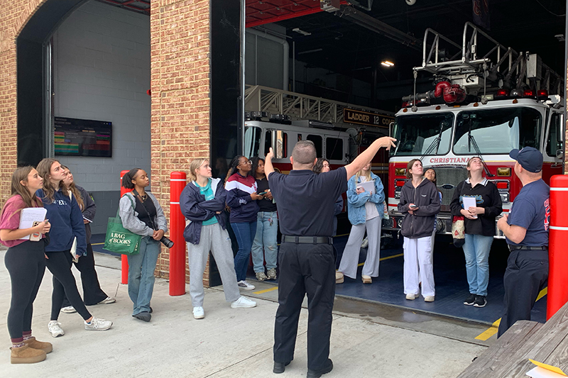 Students in the advertising methods class toured the fire company and met with fire fighters — a real-life opportunity to connect with the client.