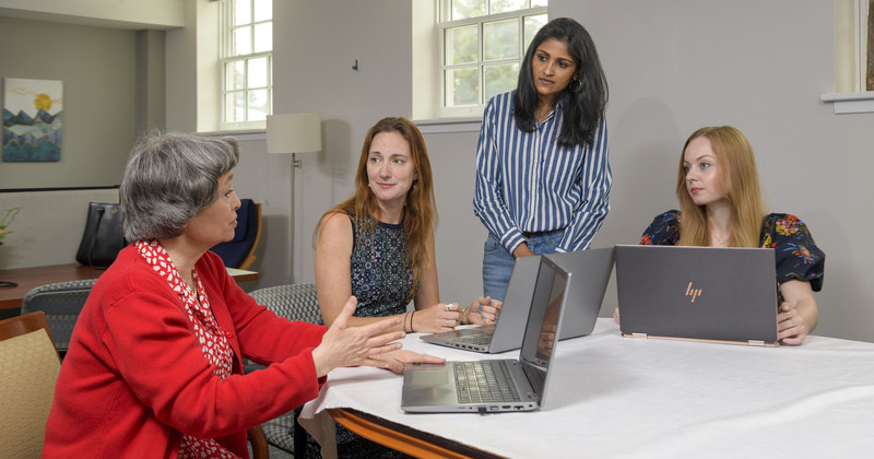 (Left to right) Susan Conaty-Buck, assistant professor of nursing; Morgan Ellithorpe, associate professor of communication; Litty Samuel, a doctoral candidate in communication; and Katelynn Kuijpers, a communication doctoral student, explore how artificial intelligence can help people with disabilities and their caregivers more easily navigate complex healthcare and disability services.