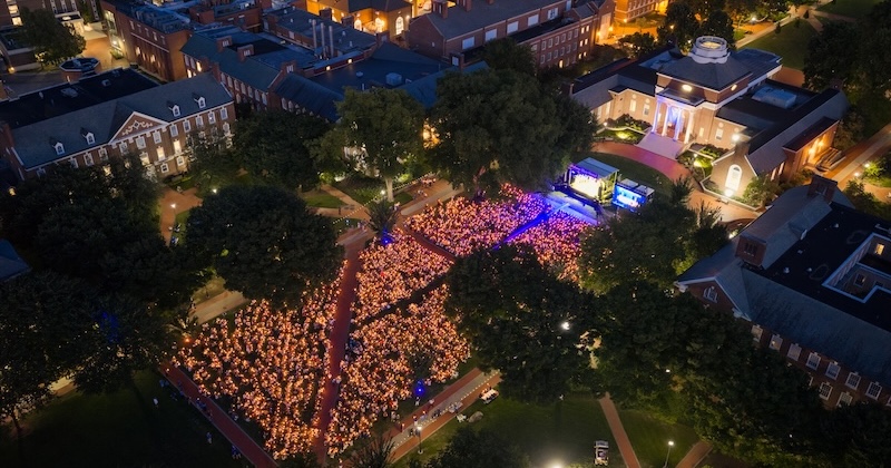 UD’s newest students gather on The Green for the University’s Twilight Induction Ceremony, a ritual that welcomes to campus all new students and marks the official start of their time at UD.