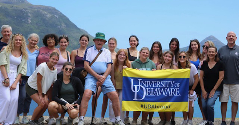 College of Health Sciences students on a Winter Session study abroad trip to South Africa stop along the scenic Chapman’s Peak Drive in Cape Town to admire the view. 