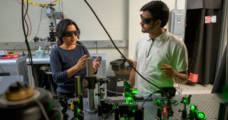 An optical detection system allows researchers Chitraleema Chakraborty and Muhammad Hassan Shaikh to “see” magnetic states in antiferromagnets using light-based signals. 