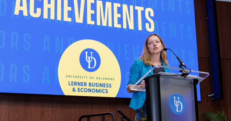 Julia Bayuk, professor of marketing and associate dean for undergraduate programs at the University of Delaware, speaks at Lerner College’s 2025 Honors and Achievements event. Bayuk was named a 2025 Poets&Quants Best Undergraduate Business Professor.