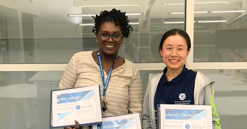 University of Delaware senior statistics major Wanning Wang received three awards for her contributions to UD’s Center for Experimental and Applied Economics (CEAE). Wang says working with research manager Aisha Emory (left) was an education in itself. 